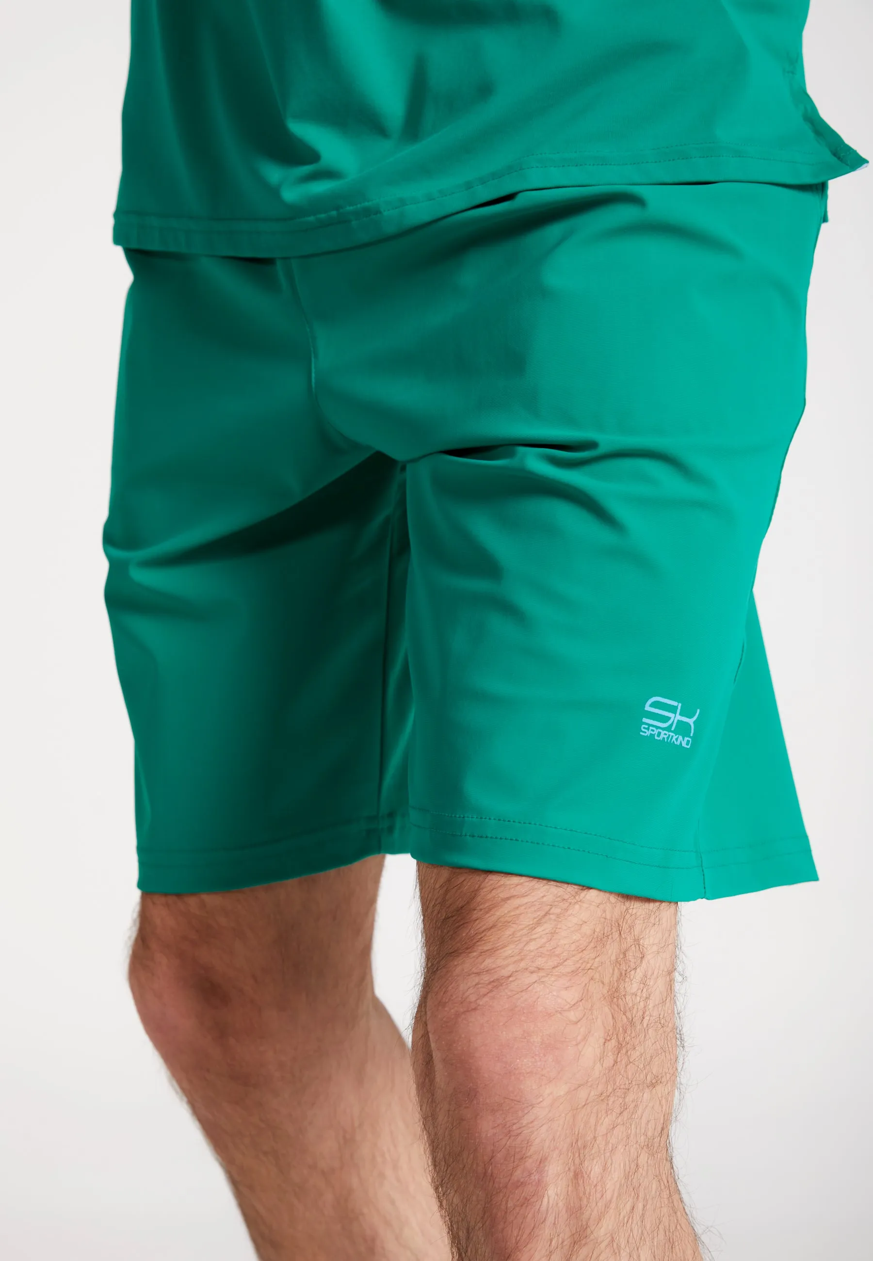 Long tennis shorts, emerald green